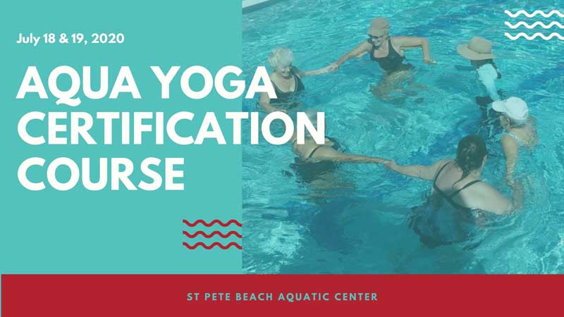 Photo of women in a pool during an Aqua Yoga class.